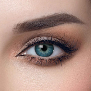 Solenza Sapphire Coast (Blue) Yearly Lenses: A pair of vibrant blue contact lenses on a clear background, showcasing their