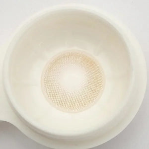 Close-up of Hidrocor Avela Brown Color Lenses, showcasing their natural brown hue and subtle limbal ring.