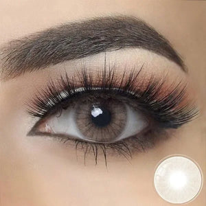 Close-up of Hidrocor Avela Brown Color Lenses, showcasing their natural hazel-brown hue and subtle limbal ring.