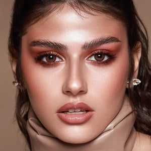 Bella Elite Cinnamon Brown Lenses, showcasing a pair of natural-looking brown contact lenses with subtle warm undertones.