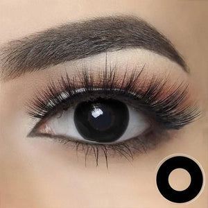 Black out Halloween Lenses, covering the entire iris for a striking, void-like effect.