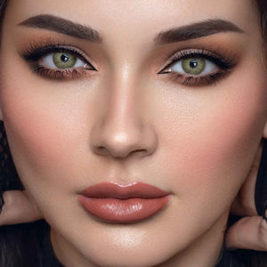 Solenza Dusk Taupe Yearly Lenses in a clear case, showcasing their subtle, natural color.