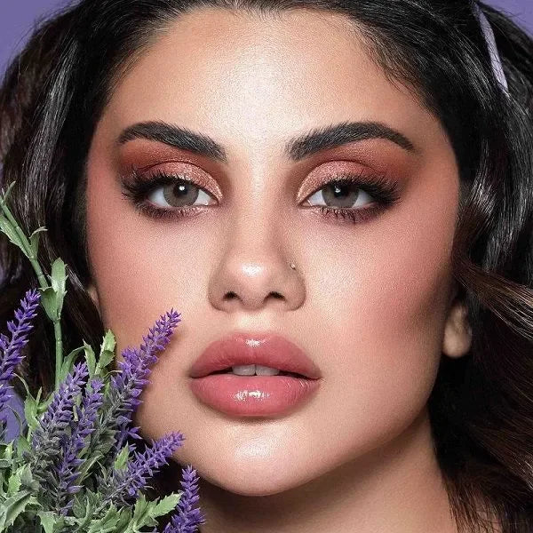 Bella Elite Green Olive Lenses in a clear case, showcasing their natural green hue.