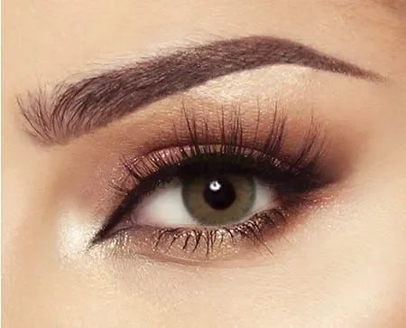 Bella Elite Green Olive Lenses shown in a product shot, highlighting their natural green hue.