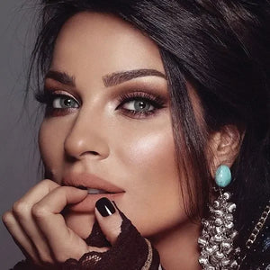 Close-up of Bella Elite Midnight Blue Lenses, showcasing their deep blue hue and subtle limbal ring.