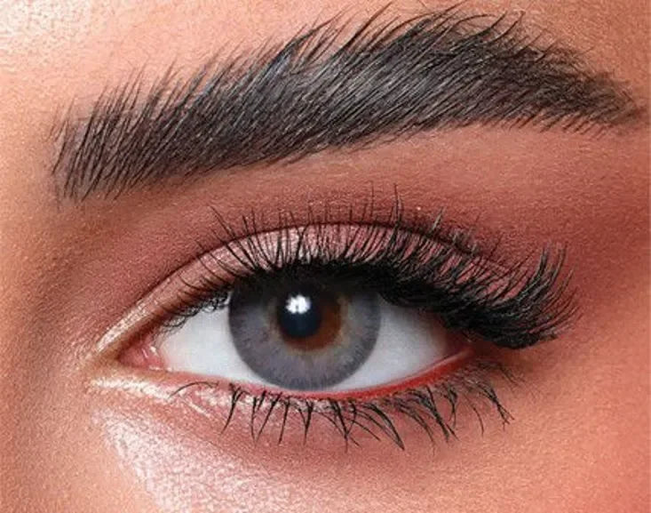 Bella Elite Midnight Blue Lenses, showcasing a pair of striking dark blue contact lenses with a subtle limbal ring.