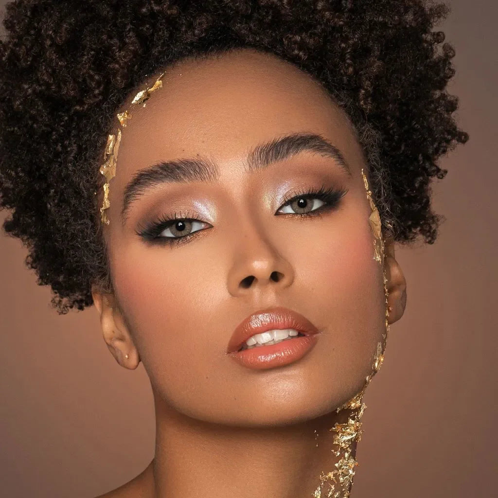 Bella One Day Cove Lenses: A pair of light brown contact lenses in their packaging, showcasing a natural, subtle color.