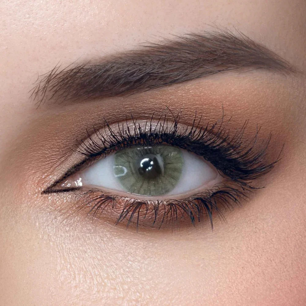 Solenza Desire Honeybee colored contacts, showcasing a warm, golden-brown iris with subtle dark limbal ring detail.