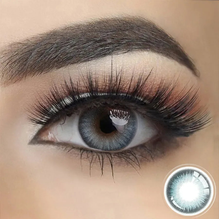 Savage Blue (1-Year) Color Lenses: Close-up of a striking blue contact lens with a subtle, natural iris pattern.