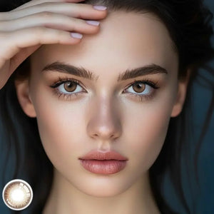 Savage Brown (1-Year) Color Lenses shown on a model's eye, featuring a natural brown hue.