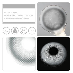 Unspoken Gray | 1 Yearly Lenses, a pair of gray contact lenses on a white surface.