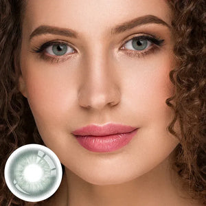 Unspoken Green 1 Yearly Lenses: Close-up of a single green contact lens with a subtle, natural-looking color.